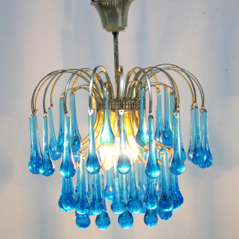 Lámpara retro en cristal de Murano - Lágrimas azules y metal plateado.
Efecto lumínico muy bonito.