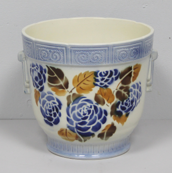 Fabricado en cerámica decorada.