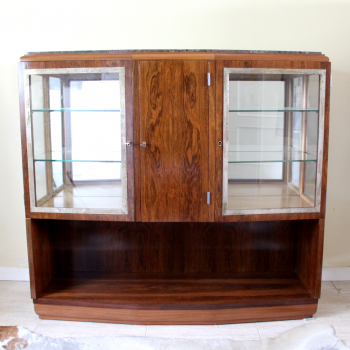 Mueble vitrina francés Art Decó - Realizado en madera de palosanto, metal plateado y cristal.